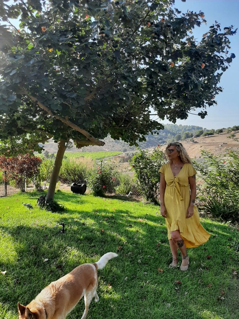 Hagit with the dog in Bat Shlomo Hagit with the dog in Bat Shlomo